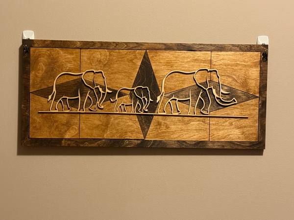 Layered elephant wood art